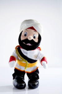 立派なおひげに真っ白なターバン<br>ラッフルズ・ドアマングッズ